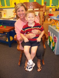 Thu 20 Aug 2009 03:06:37 PM

Andrew and his Pre-K teacher, Ms. Ross, on orientation day.