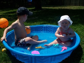 Thu 22 Apr 2010 02:00:19 PM

Andrew and Gracie enjoy an afternoon in the kiddie pool.