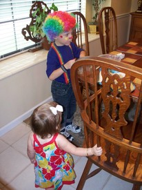 Fri 03 Sep 2010 08:03:17 AM

Gracie seems confused by Andrew's dress for circus day at school.