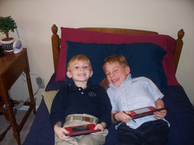 Tue 18 Jan 2011 03:10:36 PM

Andrew with his friend Brandon Bunn and their matching Nintendo DSi XL game systems...