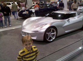 Sat 19 Feb 2011 11:16:53 AM

Andrew and Dad went to the JAX Auto Show again this year. This is a shot of Andrew in front of a GM Corvette concept car.