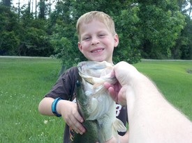Sun 20 May 2012 06:08:10 PM

Andrew's first bass, caught all by himself in our favorite lake in the CCOP.