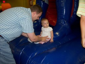 Sat 24 Apr 2010 12:30:59 PM

Dad helps Gracie bounce a little at Andrew's JumpZone birthday party.