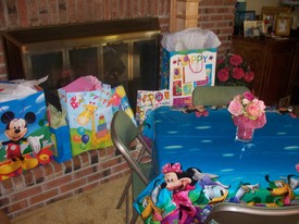 Sat 26 Mar 2011 12:45:39 PM

Gracie's 2nd birthday party was at Grandmother's and Granddaddy's house.