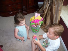 Sun 24 Apr 2011 08:25:36 AM

Gracie and Andrew check out Gracie's Easter basket.